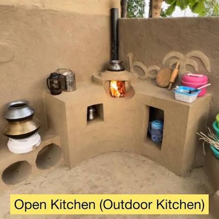 Open outdoor mud kitchen with chimney, chulha and earthen storage